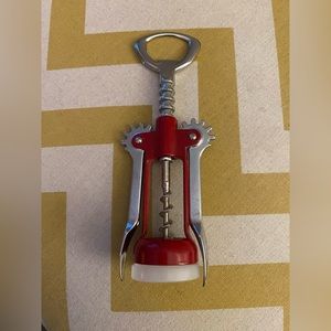 Red and chrome wine bottle opener/ cork screw